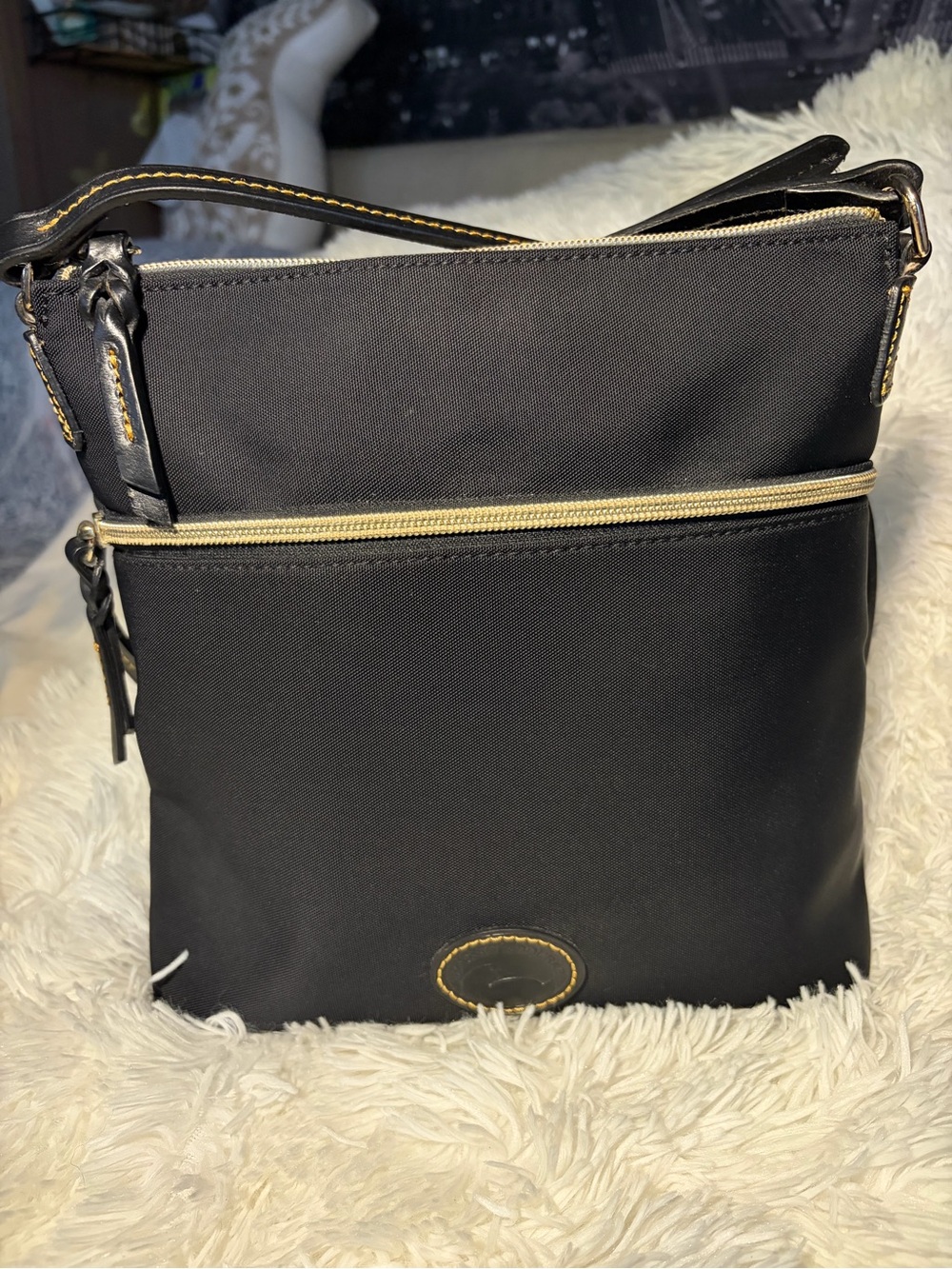 Dooney & Burke Sleek Black Nylon Crossbody Bag with Gold Accent Trim